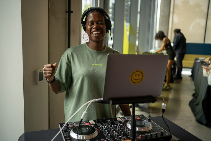 DJ at a computer.