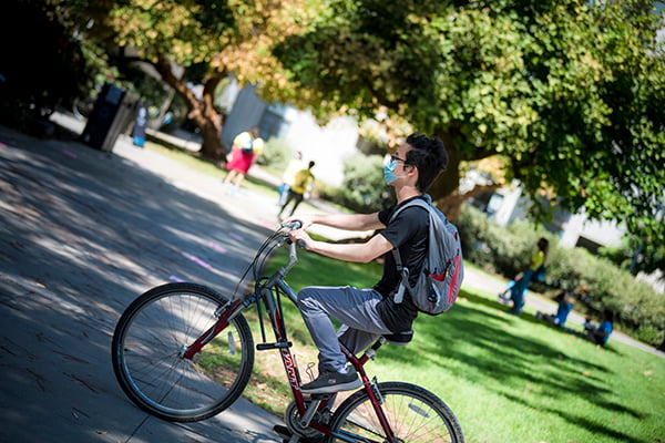 student on bicycle