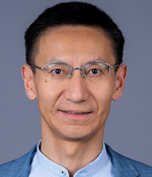 headshot photo of Sheng Zhong