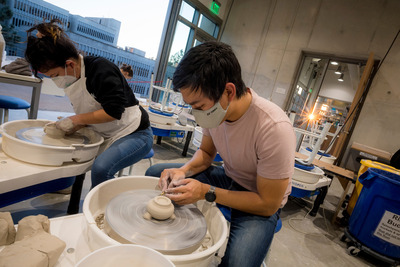Students creating pottery at the UC San Diego Craft Center.