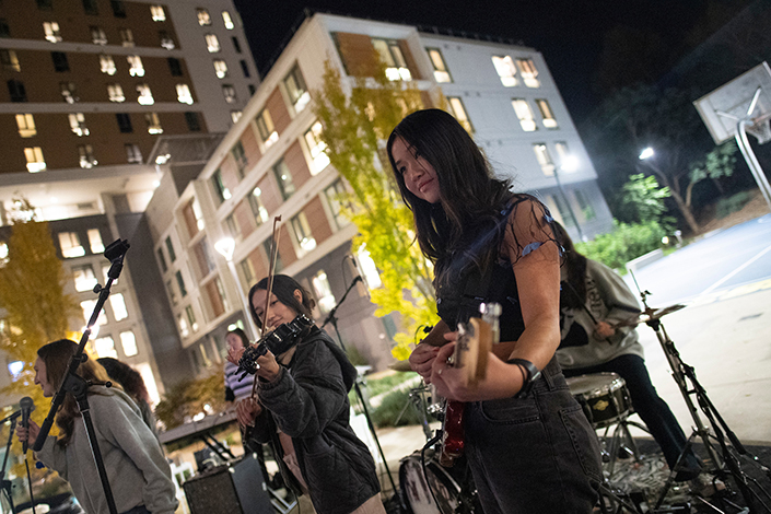 Four female students perform during the festival as part of the band Shawty Shack.