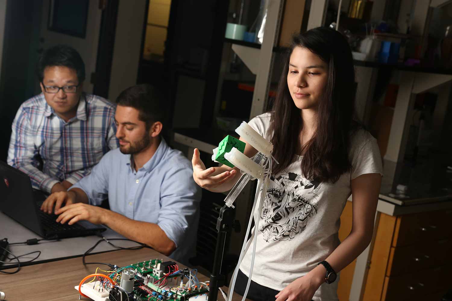 Image: Ph.D. students Benjamin Shih, Dylan Drotman and student Adriane Minori