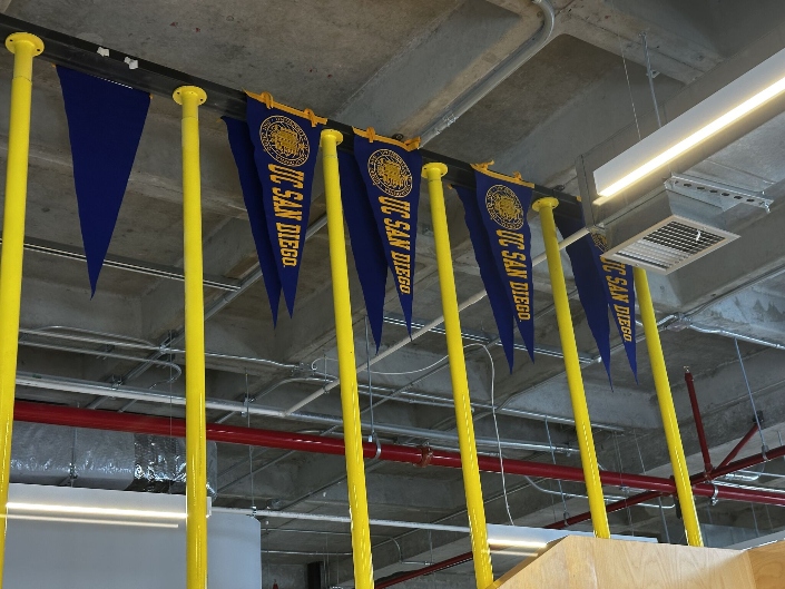 UC San Diego pennants hang from the high ceilings in the ITJ classroom space