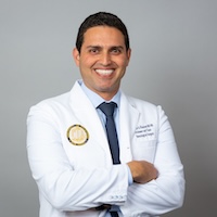 Headshot of Dr. Khalessi in his white coat