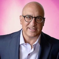 Photo of man with glasses in suit
