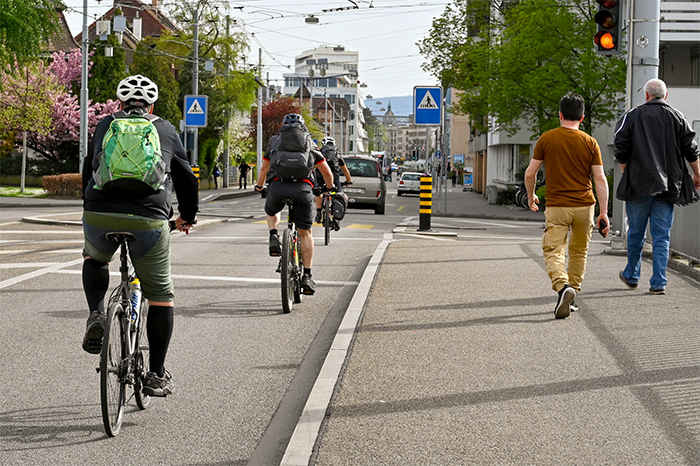 Bicycle commuters pictured in traffic