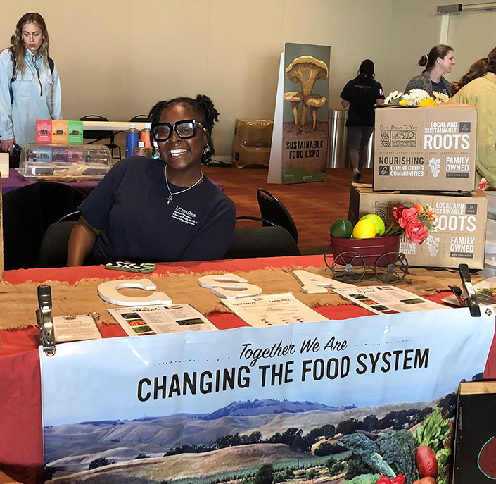 Fahsyrah Knight, a graduate student studying public health at UC San Diego, provided information on Farm Fresh to You, a Community Supported Agriculture service that delivers organic produce straight to doors.