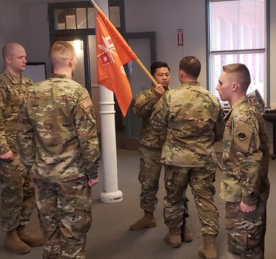 Minas (center, holding flag) performing the Change of Command military tradition where he was assuming command of a unit in Salt Lake City in February of 2019.