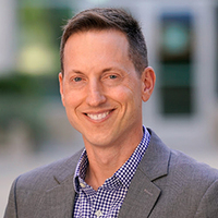 Christopher Oveis, an associate professor at the Rady School of Management 