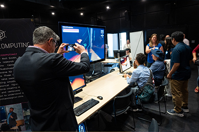 Person taking photo of gaming