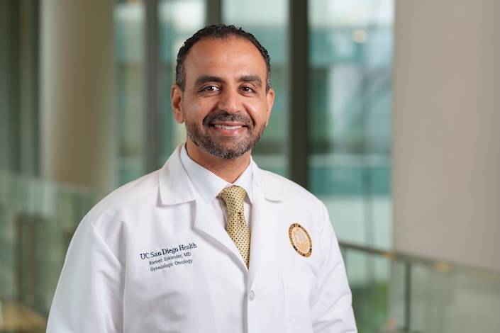Photo of doctor with beard in white lab coat