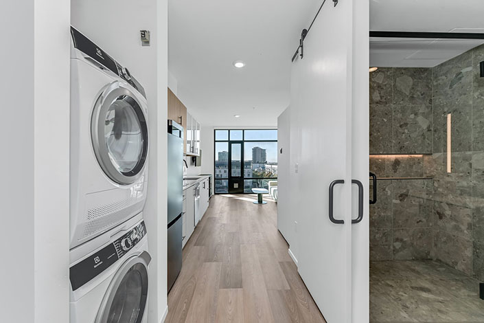 Each unit is fully-furnished and features floor-to-ceiling windows, a stacked washer/dryer, flat screen TV and a large walk-in shower.