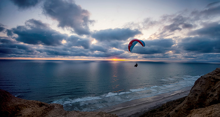 Glider over Torrey Pines at sunset
