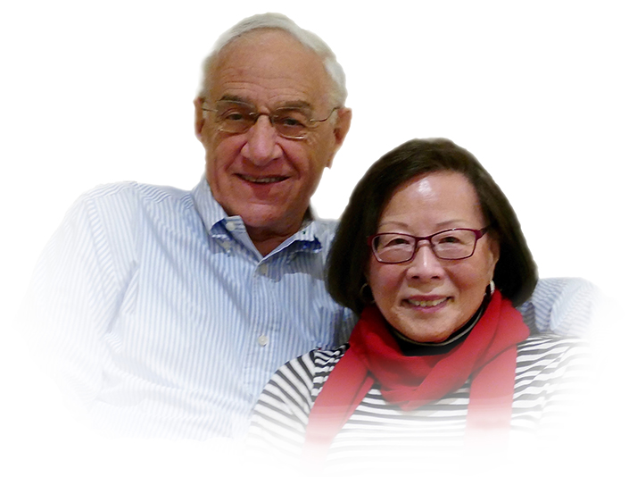 Photo of man and woman smiling 