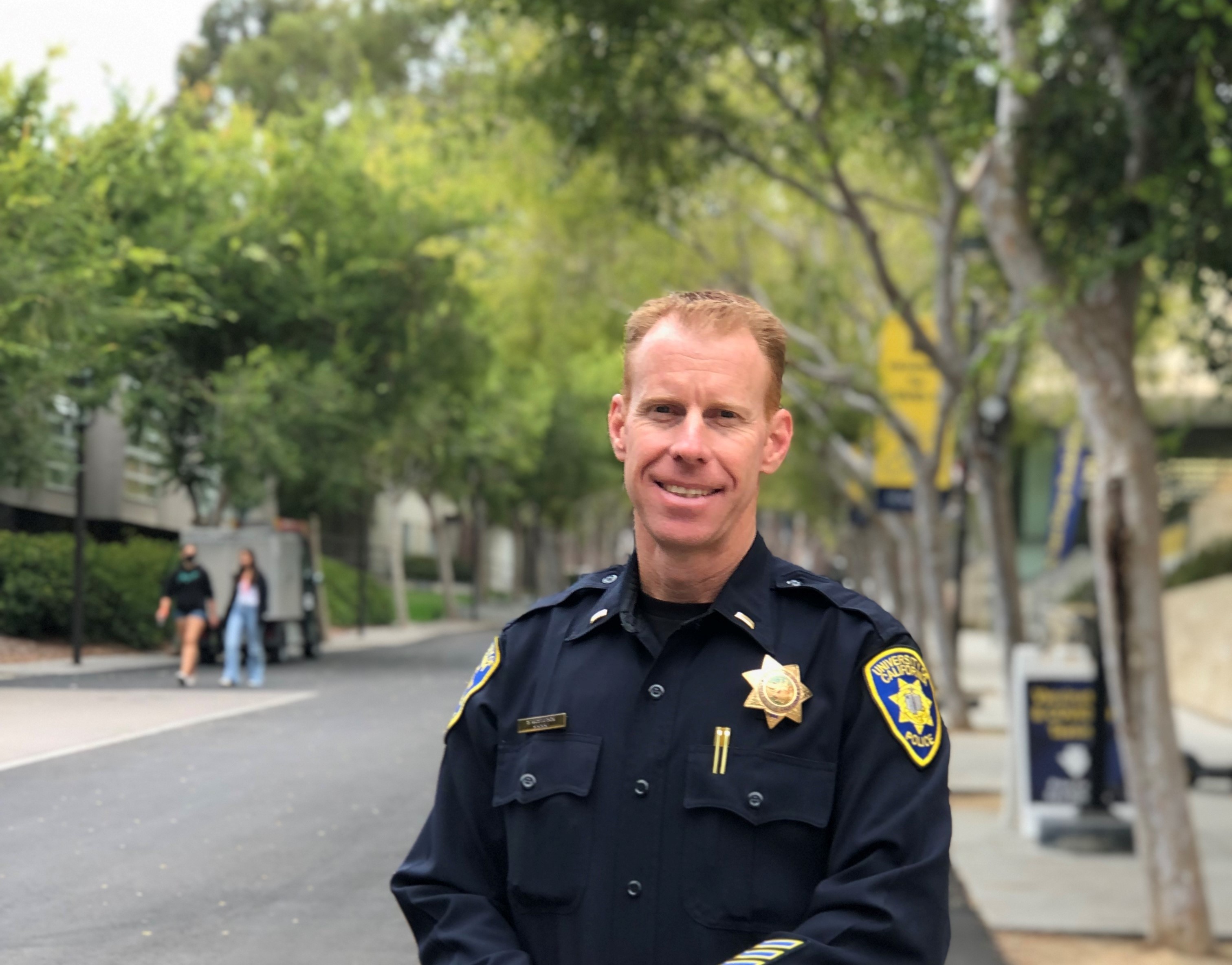 Special Events and Community Programs Lieutenant Scott Gustafson stands outside on the UC San Diego campus. 