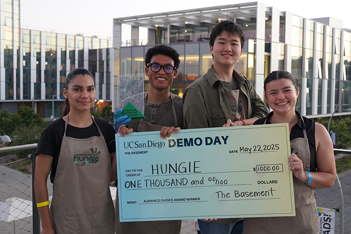 The Hungie team celebrate winning Audience Choice Award, featuring (left to right) Alexa Fernandez, Kamaal Walker, Eric Cai, and Mina Garcia.