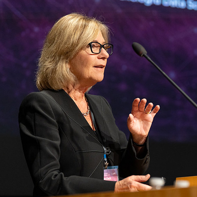 Woman talking into microphone
