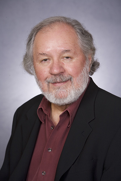 Brian with slight smile