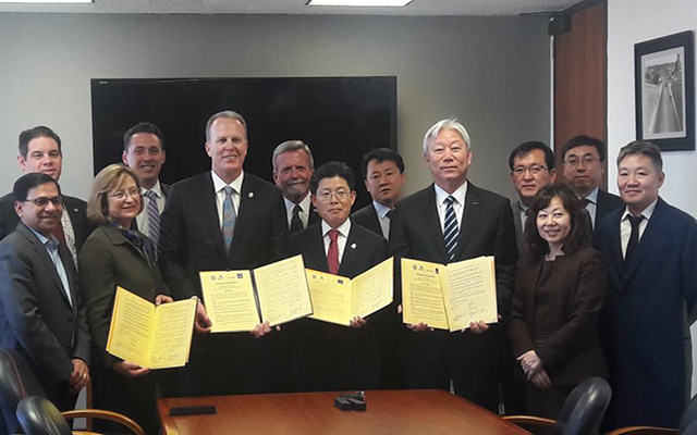 Leaders from the City of San Diego, UC San Diego, Ulsan and UNIST sign a Memorandum of Understanding for the collaborative Smart Transportation Innovation Program.
