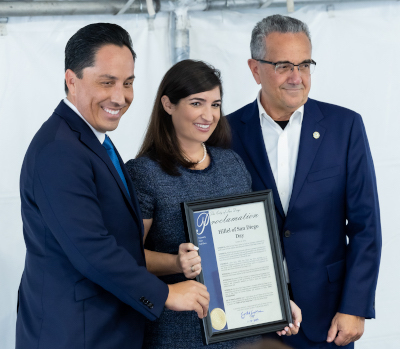 Mayor Todd Gloria presents proclamation to Karen Parry