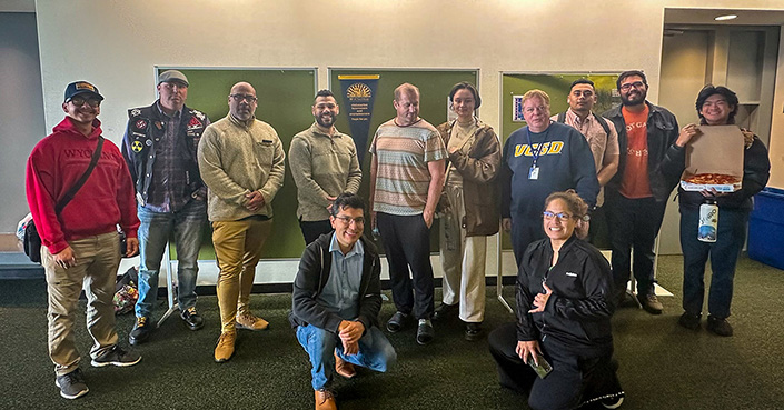 The inaugural cohort of the Nano3 veterans’ workforce training program stands with Yves Theriault (fourth from right) in QI’s Atkinson Hall.