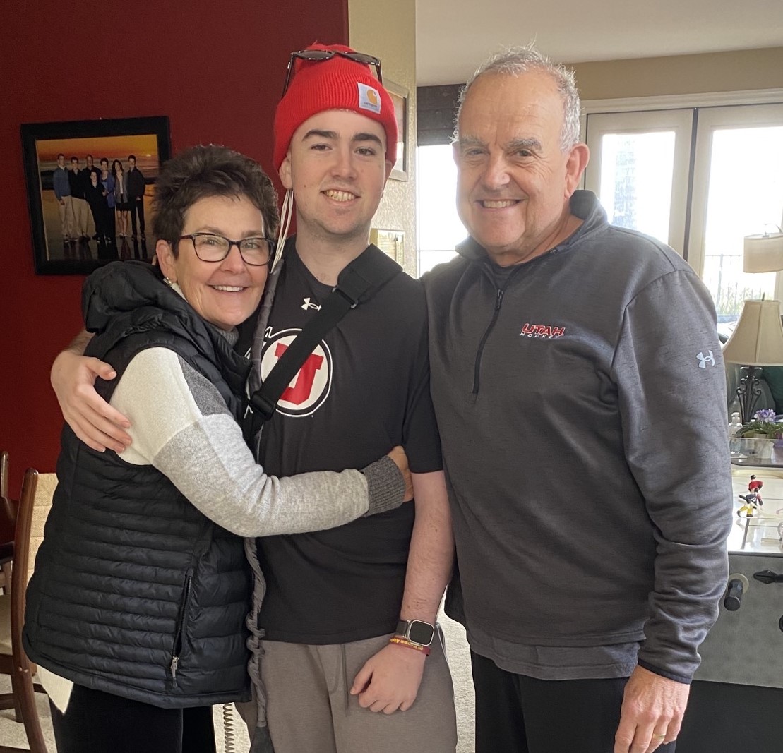 Anne O'Donnell (left) hugs her son, Paddy (middle), and Hugh O'Donnell on the right.