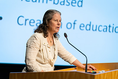Professor Pam Cosman delivers opening remarks at public presentations for the 2023 NeuroDiversity in Tech internship.