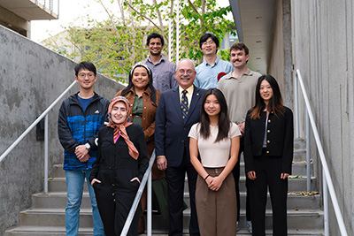 The eight award recipients pose with Albert P. Pisano, Dean of the Jacobs School of Engineering and Special Adviser to the Chancellor
