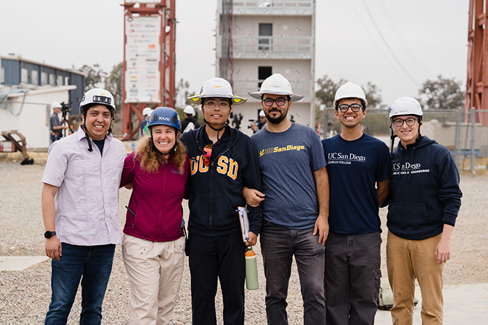 Picture of a group of students and a faculty member in hard hats
