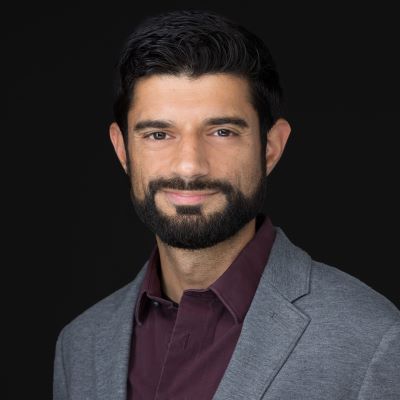 headshot of Cyrus Rustomji