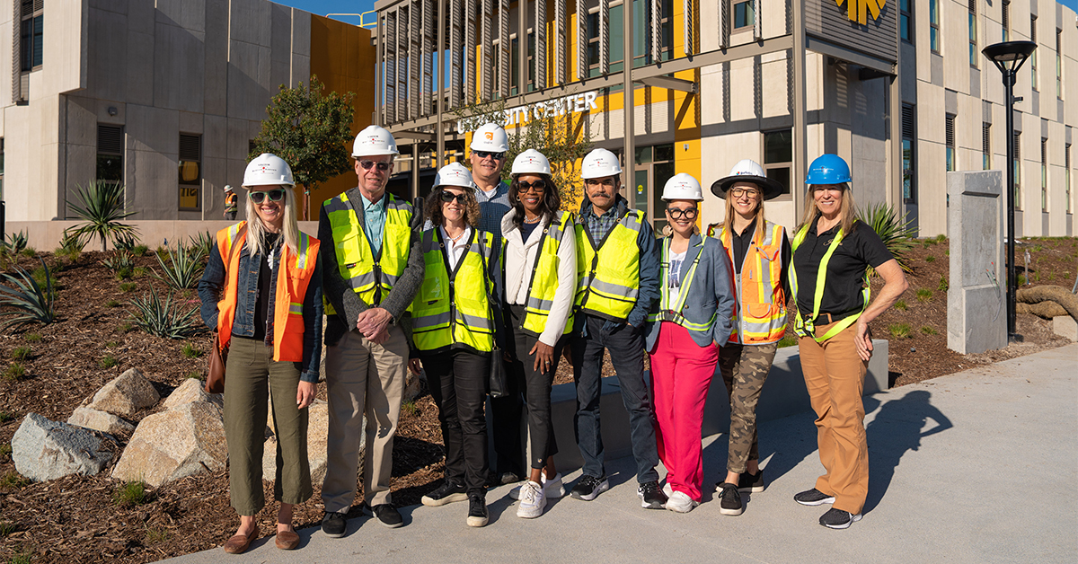Photo of UC San Diego and Southwestern College leadership in front of the new University Center building.