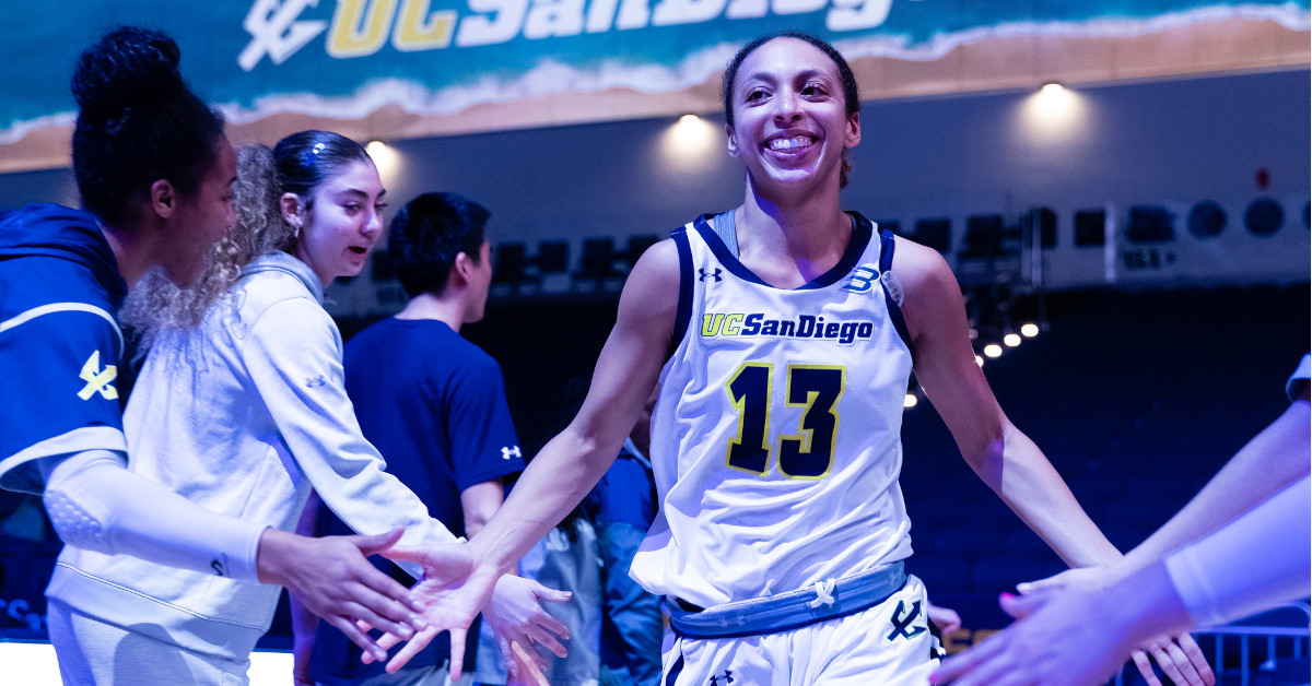 Student-athlete Sydney Brown rejoices on basketball court