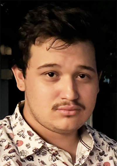 Photo of Thunder Santillan, unsmiling with mustache