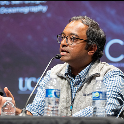 Man speaking into microphone