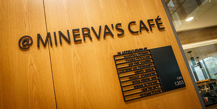 Signage reads @ Minerva's Cafe, with the names of the 10 donors 