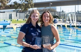 Kimberly Holland (left) and Hannaford Bush were recently honored with the Hero Award for Excellence at a poolside ceremony.