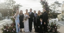 Perley family in group wedding photo outside