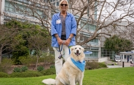 Amber Kiefer with therapy dog Willow.