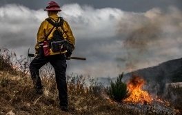 Marine Corps firefighter Sgt. Jake McClung supervises a controlled burn at Marine Corps Base Camp Pendleton, California.