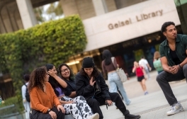 Students gather in front of Geisel Library.
