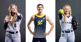 Three scholar-athletes in their team uniforms posing 