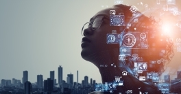 A woman with ideas and images illustrated from her brain.