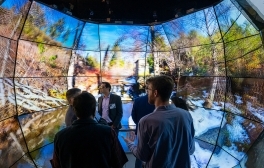 People explore an 3-D display