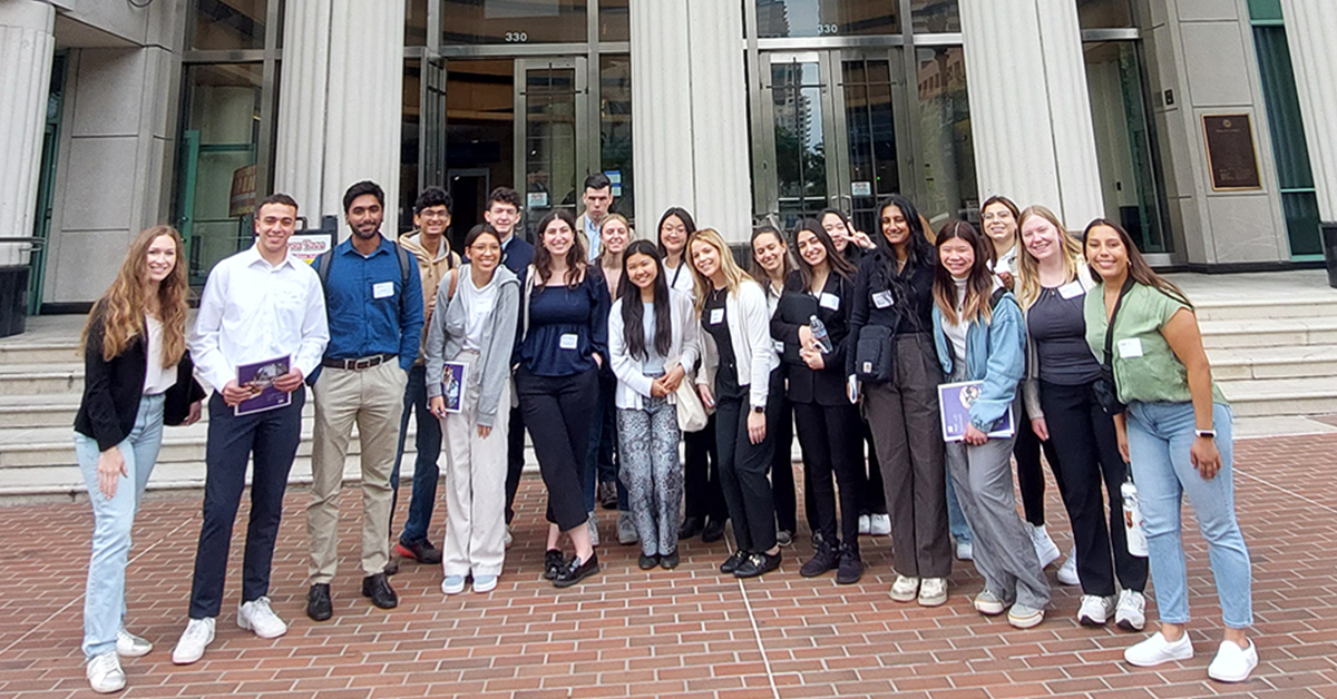 Group of Law and Politics Initiative students in front of courthouse in downtown San Diego