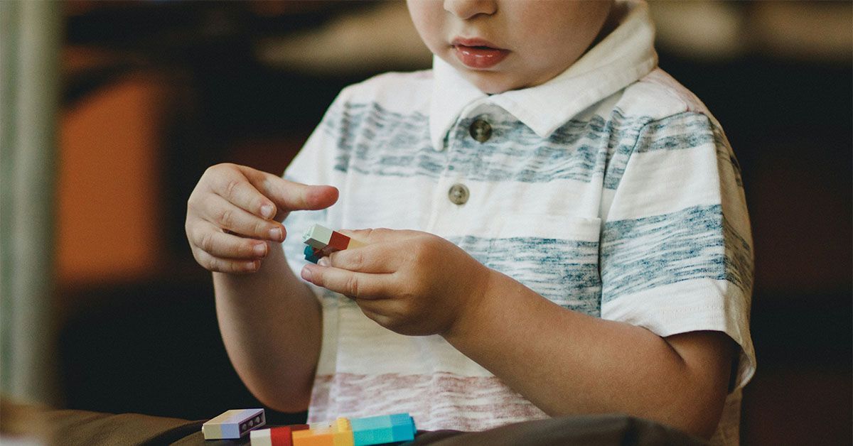 child playing with blocks