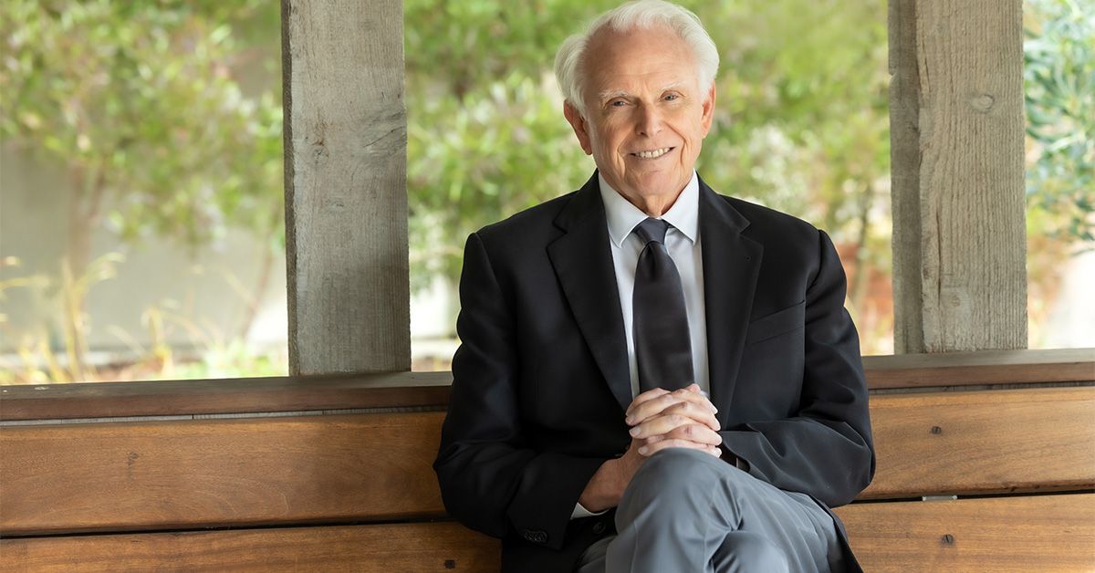 Dr. William Mobley sitting on bench