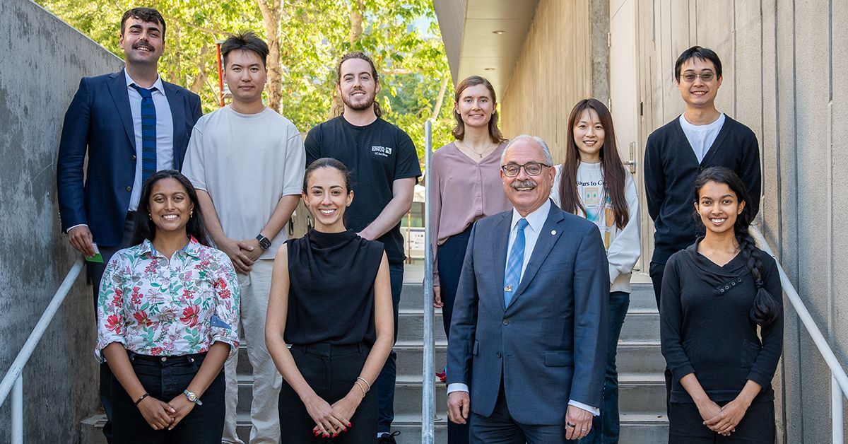 Nine Ph.D. students who won awards at Research Expo 2026 pose with Albert P. Pisano, dean of the Jacobs School of Engineering.
From left:  top row: Can Uysalel, Songyuan Lu, Seth Farrell, Tara Porter, Mingyue Zhang, Baicheng Chen, bottom row: Tanya Kumar, Lubna Amer, Dean Albert P. Pisano and Deepta Bharadwaj.  