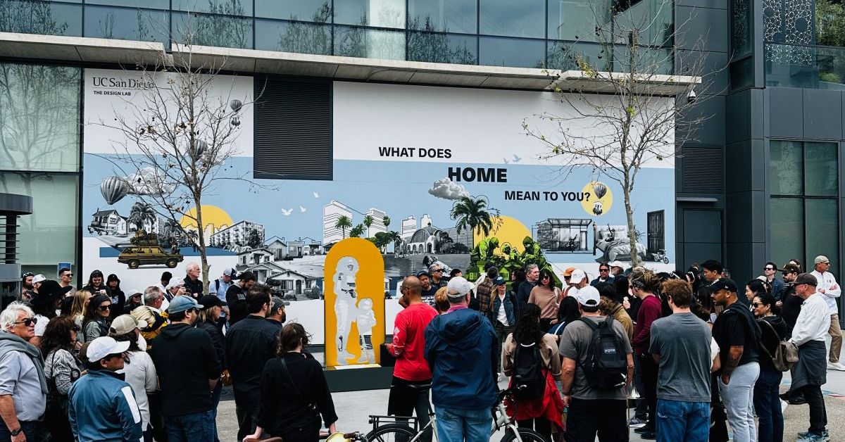 A photo of a statues from the piece in front of UC San Diego Park & Market.