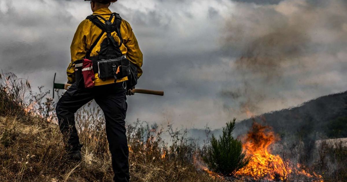 Marine Corps firefighter Sgt. Jake McClung supervises a controlled burn at Marine Corps Base Camp Pendleton, California.