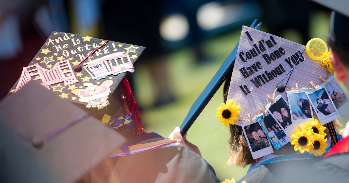 Graduation caps decorated with flowers and phrases of gratitude 